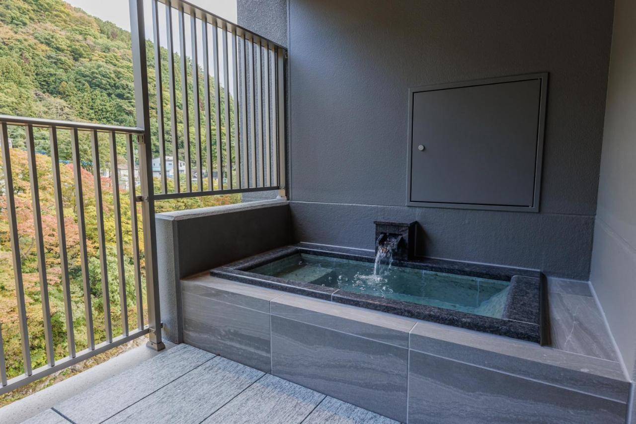 Готель Minakami Onsen Aratashi Мінакамі Екстер'єр фото